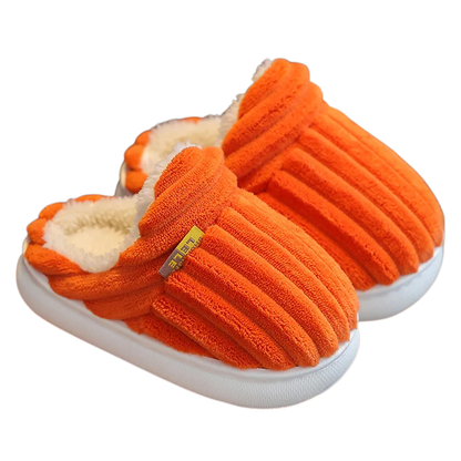 Cozy kids' winter slippers, anti-slip plush footwear for secure and warm indoor comfort.