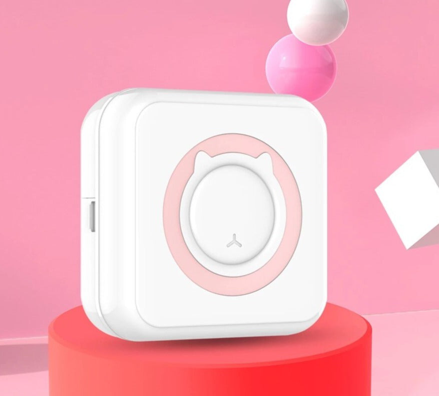 Child holding a vibrant instant photo printer, ready to print fun memories, a portable gadget.