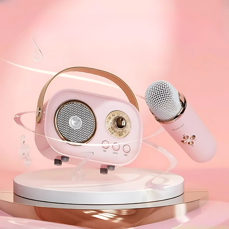 Kids' portable karaoke system in pink with dual microphones, fun music toy for children's entertainment.