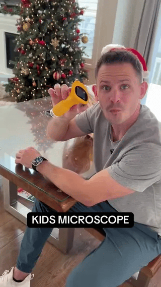 Children's portable microscope, red color, for educational science discovery, magnifies small objects, great biology toy.