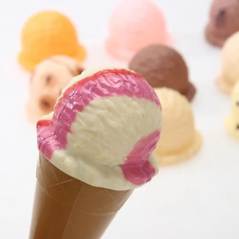 Ice cream stacking toy set for kids, laid out to show all components for imaginative pretend play