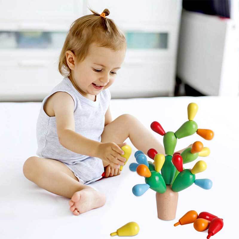 Partially stacked Rainbow Cactus wooden toy, demonstrating the challenge of this kids' stacking game