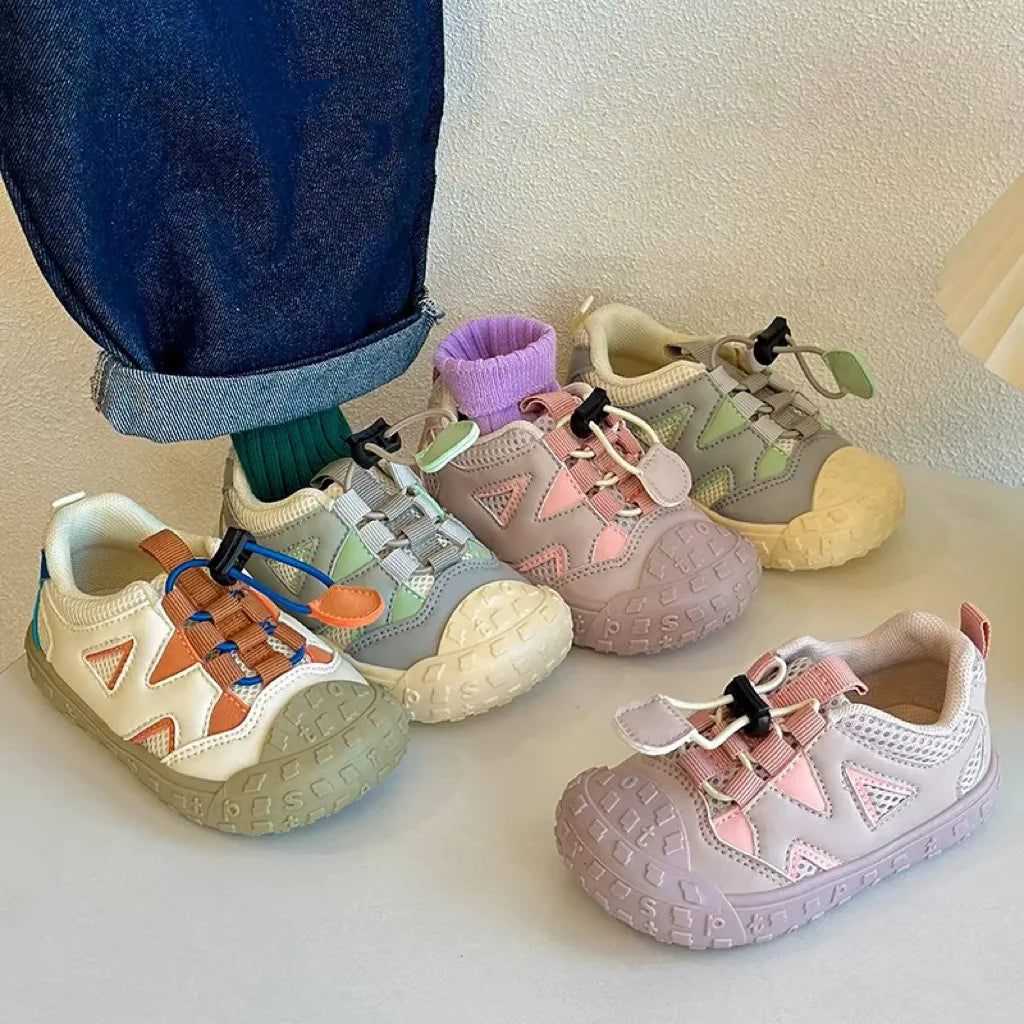 Blue non-slip sole children's footwear, mesh upper toddler sneakers with easy hook and loop closure.