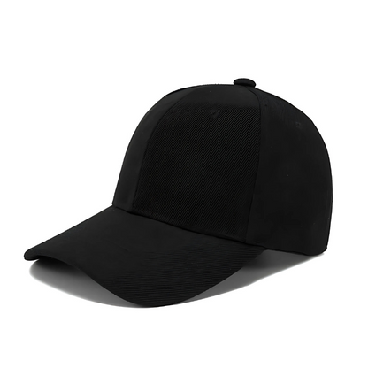 Close-up of a kids' black cotton baseball cap showing adjustable strap and breathable fabric