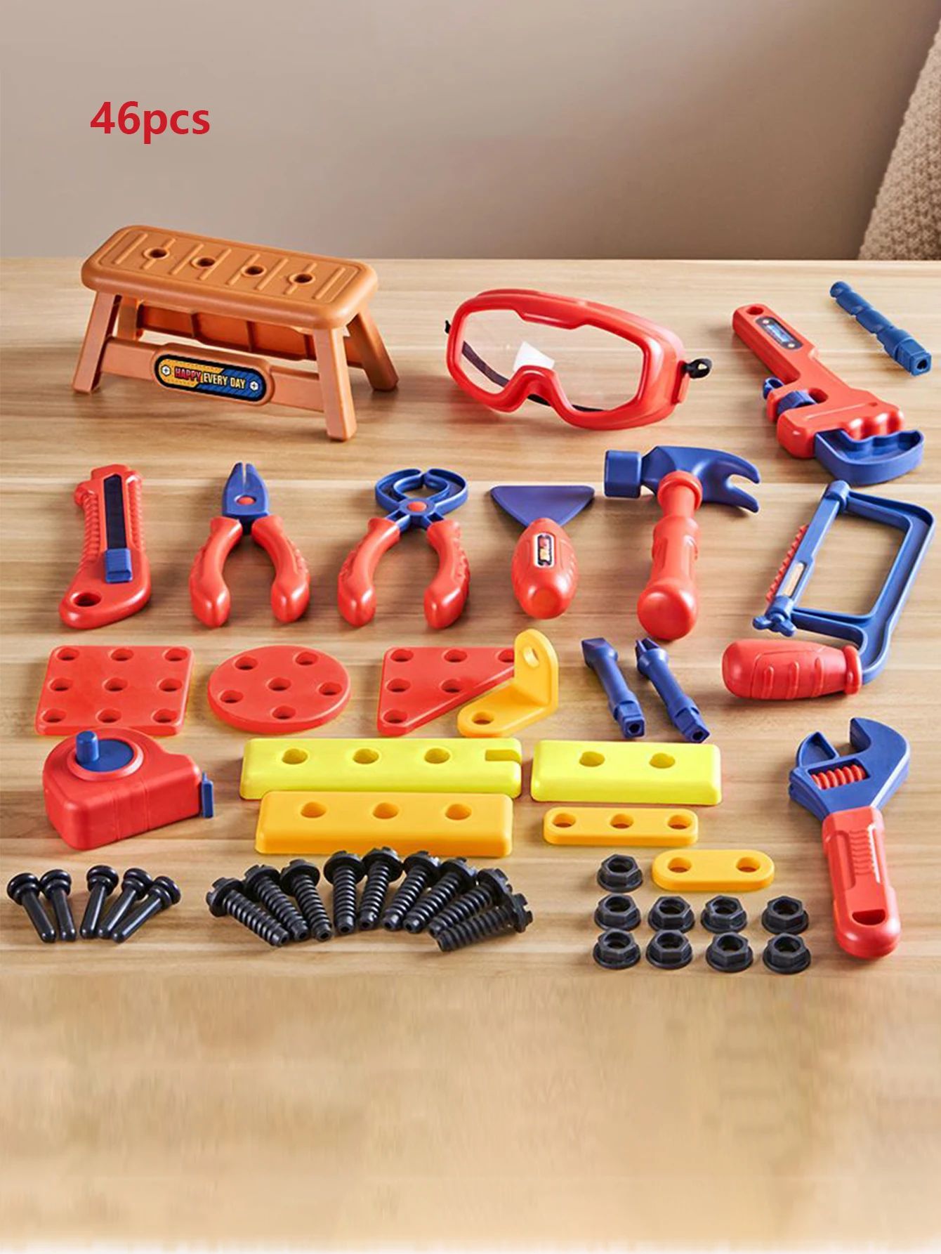 Assortment of plastic tools from a kids' educational construction set, early learning gift idea