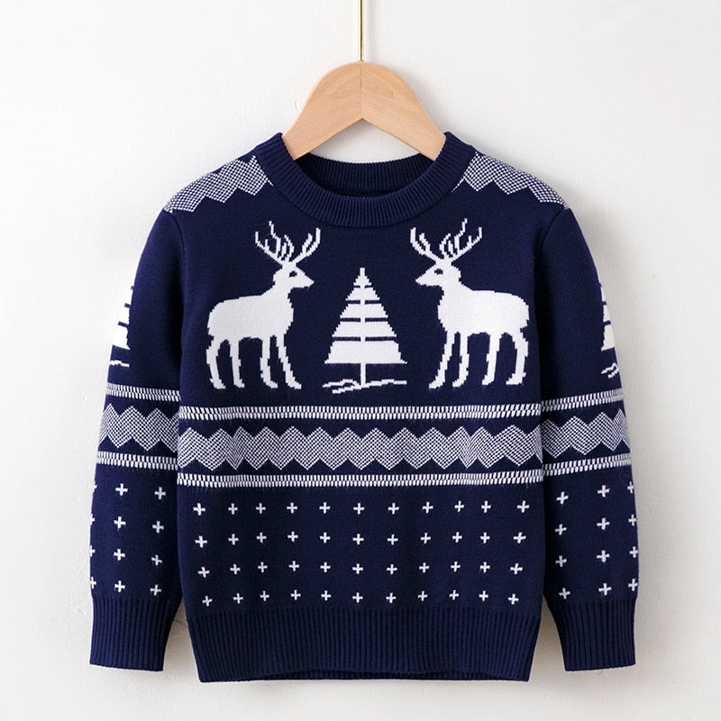 White festive Christmas sweater for kids with a bell design, ideal for family photos