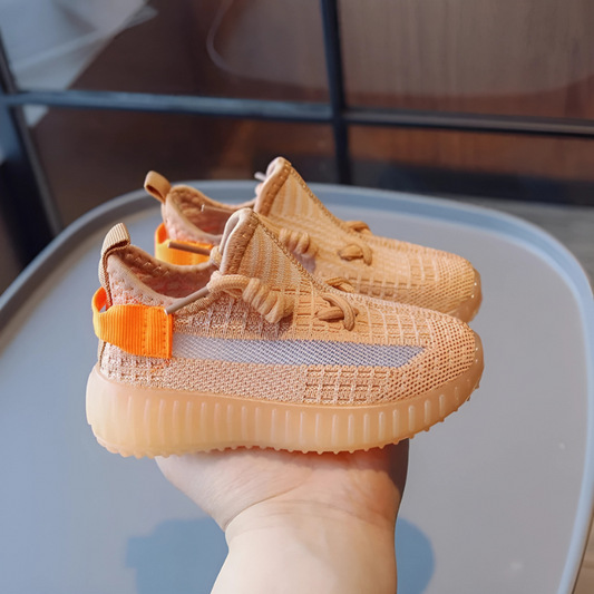 Kids' red mesh slip-on sneakers for active play, breathable children's athletic footwear