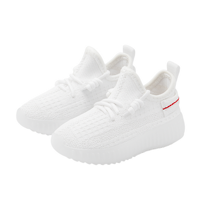 Close-up of the breathable mesh fabric on kids' slip-on sneakers, lightweight youth athletic shoes