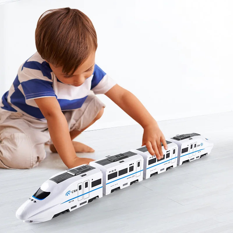 Durable plastic kid's toy train, self-propelled with flashing lights and engaging sounds for children