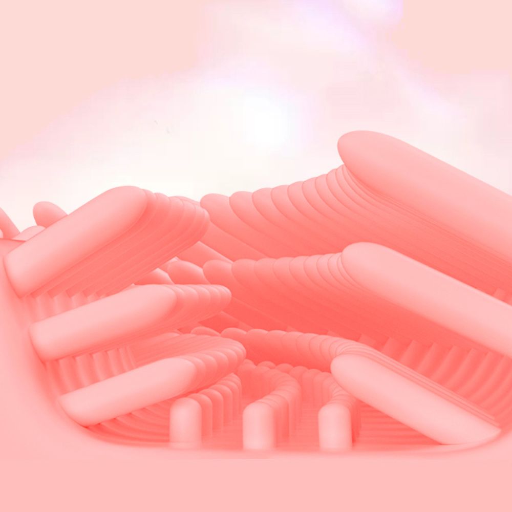 Close-up of a pink silicone brush head on a kids' sonic electric toothbrush for gentle gum care.