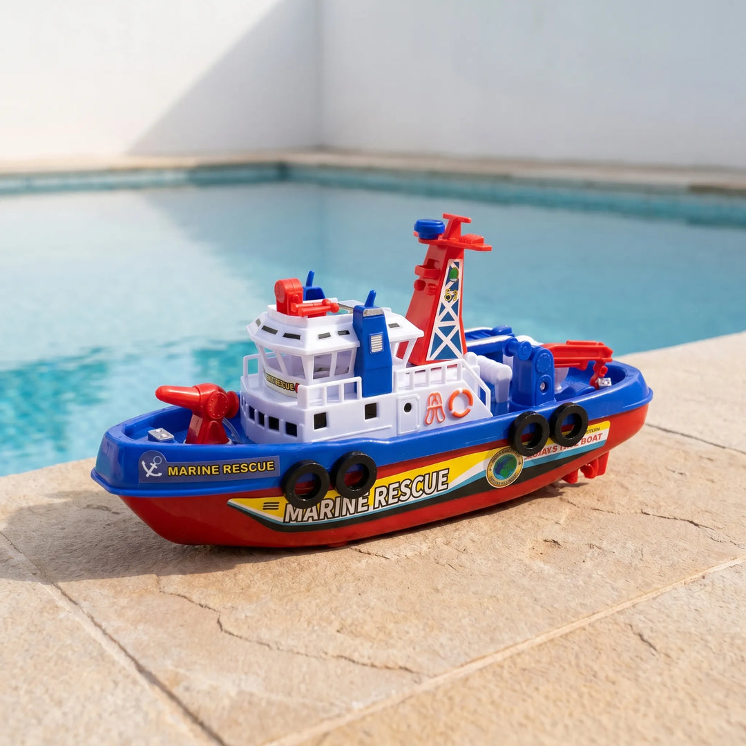 Kids' red water-spraying fireboat bath toy with working motor, perfect for interactive bathtub fun.