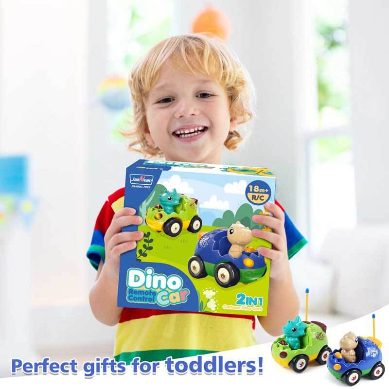 Child smiling while operating remote control dinosaur toy car, ideal christmas gift