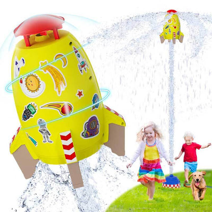 Kids rocket sprinkler water toy in action, spraying water high for summer outdoor fun.