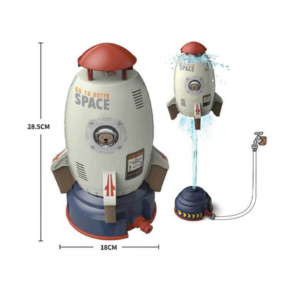 Outdoor summer scene featuring a rocket sprinkler, a fun water toy for children's backyard activities.