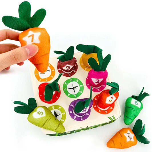 Kids Sensory Carrot Picking Toy Board with seven soft, colorful plush carrots in a brown fabric planter.