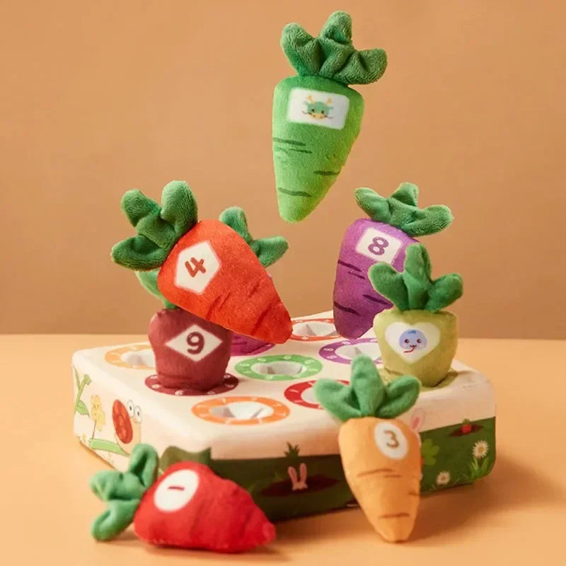 Kids activity plush toy board with felt 'soil' and removable soft carrots, promoting fine motor skills.