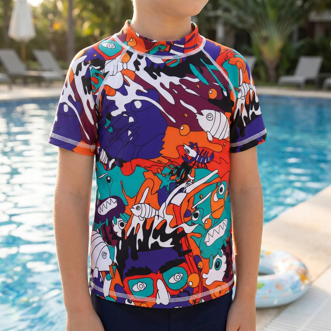 Kids' short-sleeve rash guard, sun protective swimwear for beach & pool play. Essential children's swim top.
