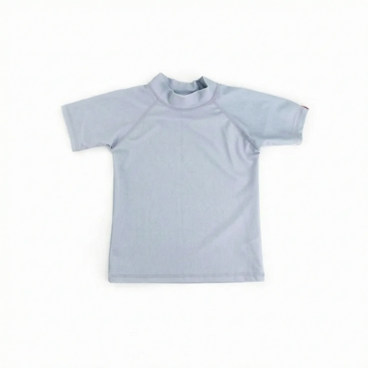 Children's short-sleeve rash guard, perfect for sun protection at the beach & pool. Stylish & comfy swimwear.