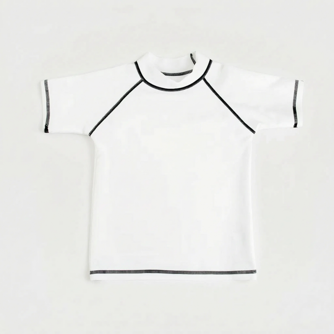 Active kids' short-sleeve rash guard. Lightweight swim top for summer beach trips & pool games. UV protective.