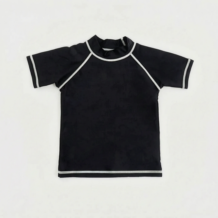 Colorful short-sleeve rash guard for kids. Provides UV protection for beach outings & pool time. Children's wear.