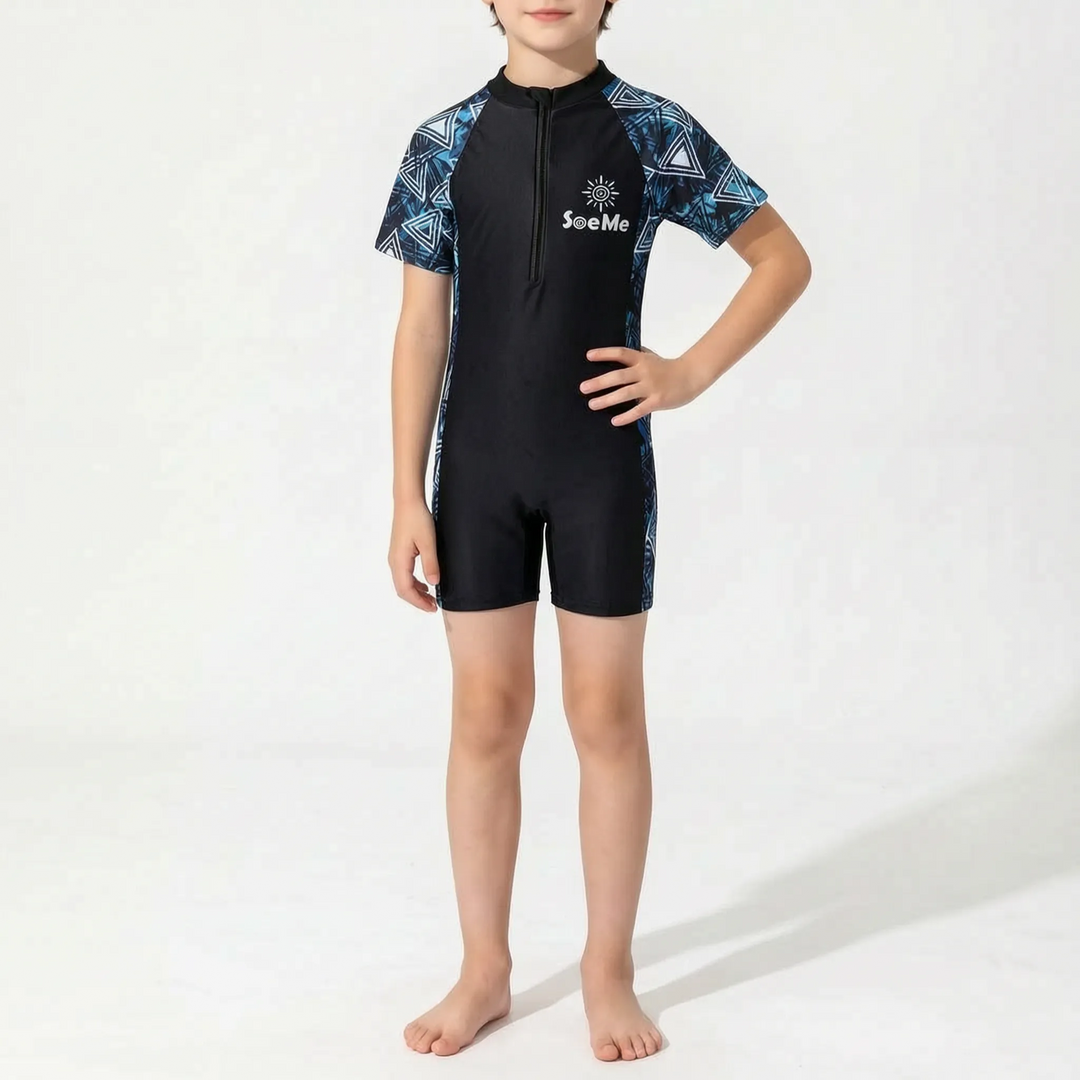 Stylish kids' one-piece rash guard swimwear, a vibrant summer outfit for active beachwear & pool days.