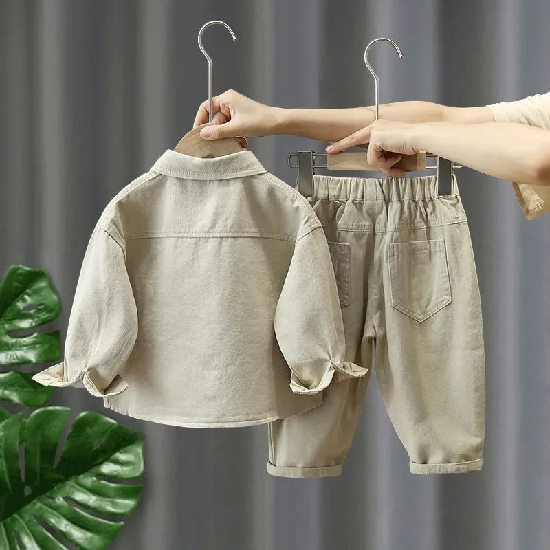 Childrens' fashion denim jacket and trousers set, ideal for autumn playtime