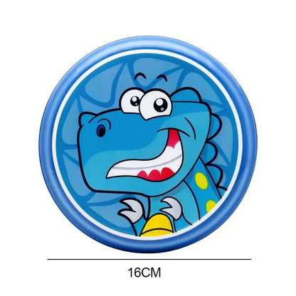 Child's hand catching a flying orange foam dinosaur frisbee, promoting active outdoor fun