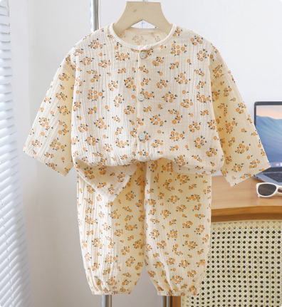 Stack of folded kids' organic cotton linen sleepwear, ready for a cozy night