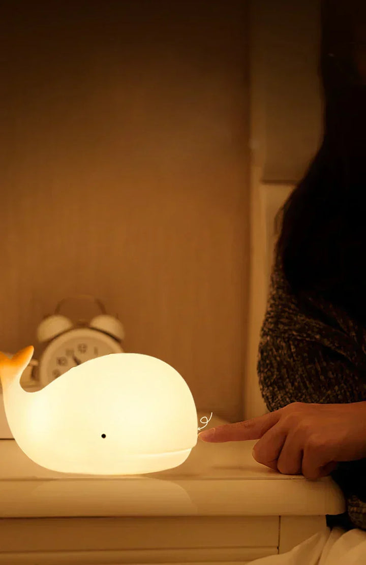 Adorable whale night light for kids. Soft, color-changing glow provides comfort in any children's nursery.