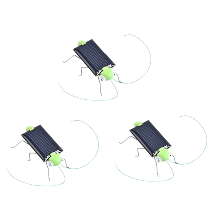 Close-up of a solar powered hopping grasshopper toy, an engaging science gift for kids' education and fun
