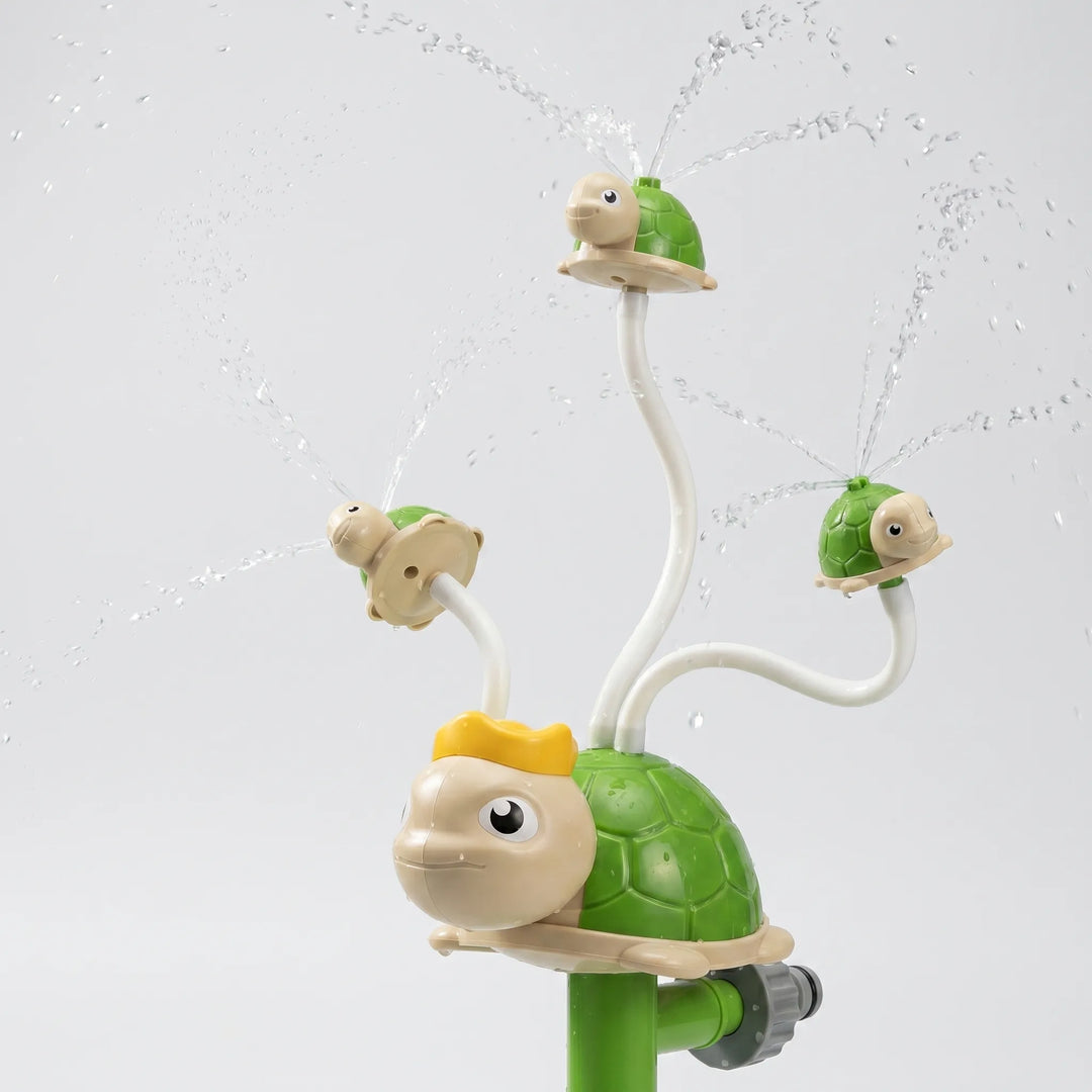 Brightly colored children's spinning water sprinkler for outdoor garden and backyard fun.