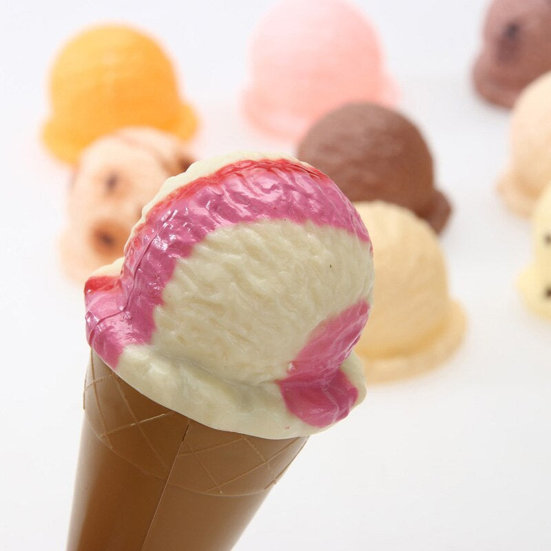 Vibrant ice cream stacking game pieces neatly arranged, ready for creative play, great for sensory learning.