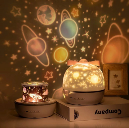 Kids' Starry Sky Night Light Projector illuminating a child's bedroom with celestial stars and moon