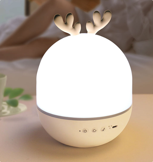 Kids' room star projector lamp, designed as a spherical device, casting a peaceful starry sky