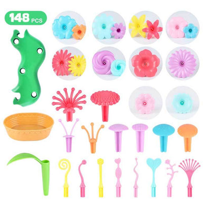 Child assembling a colorful flower structure using a STEM building blocks toy set