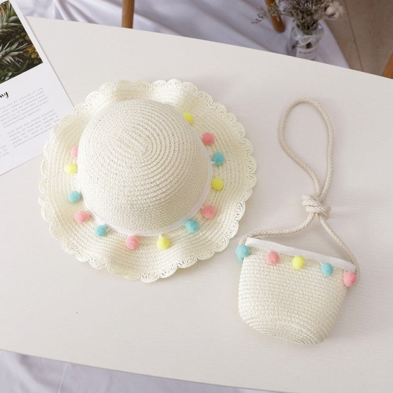 Summer-ready kids straw hat & bag set, offering stylish sun protection and a fun accessory for children.