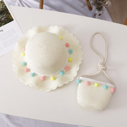 Summer-ready kids straw hat & bag set, offering stylish sun protection and a fun accessory for children.