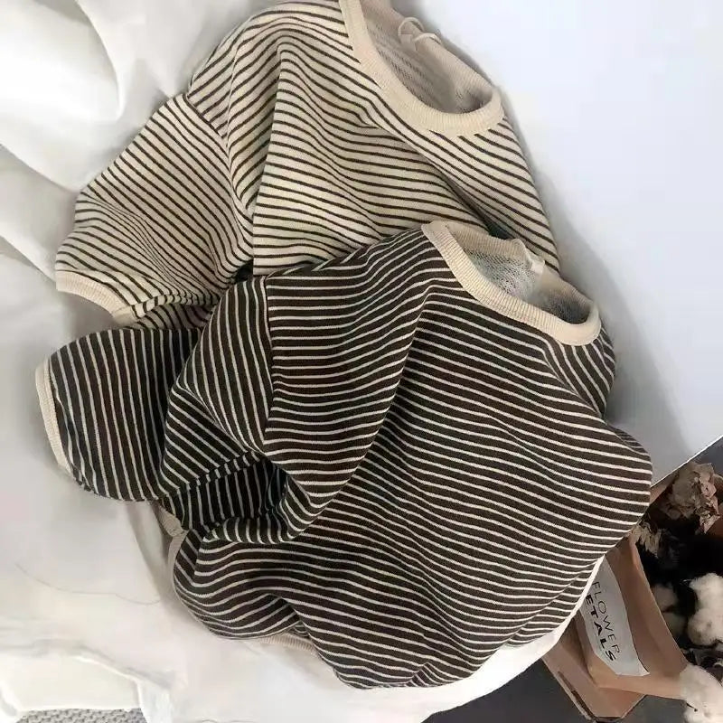 Little girl playing in a soft striped cotton blend sweatshirt, everyday wear