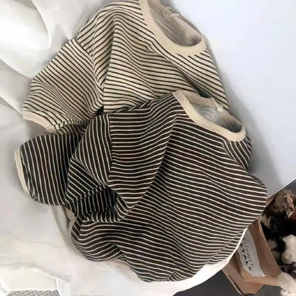 Little girl playing in a soft striped cotton blend sweatshirt, everyday wear