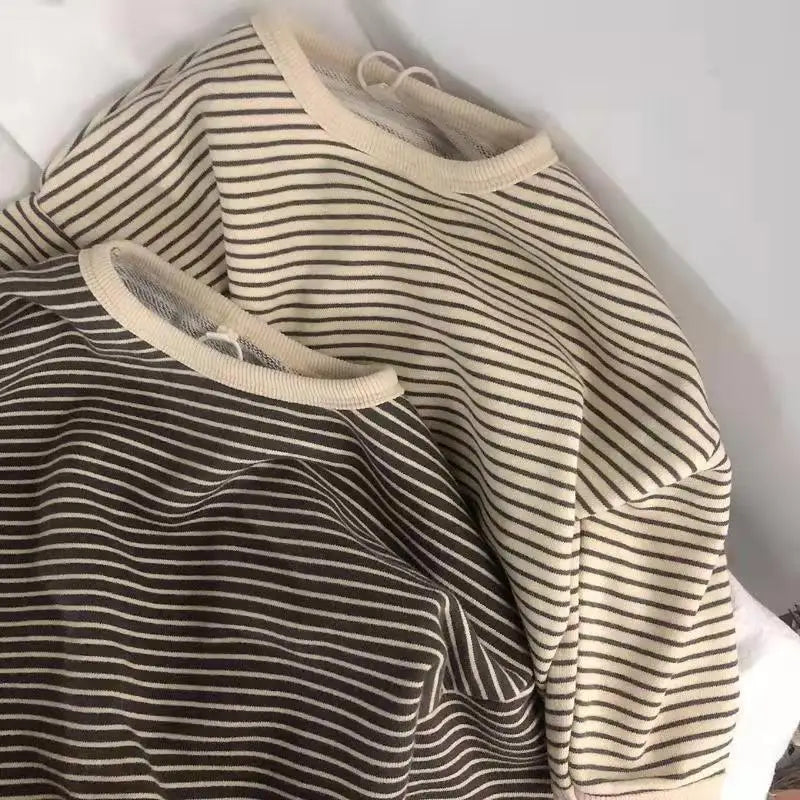 Kids' striped sweatshirt made from breathable cotton blend, ideal for active children
