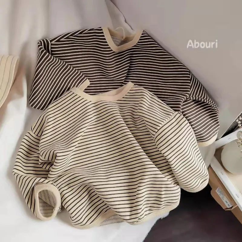Close-up of kids' striped cotton blend sweatshirt fabric, soft and durable, fall fashion