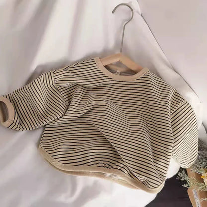 Child wearing a striped cotton blend sweatshirt, casual and comfortable, for boys & girls