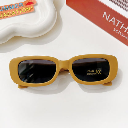 Children eyewear: comfortable rectangle sunglasses with full UV protection, great for sunny days.