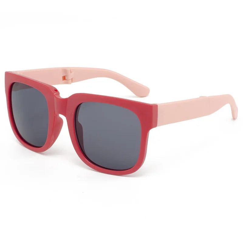 Stylish purple kids sunglasses with UV400 eye protection and durable plastic frame