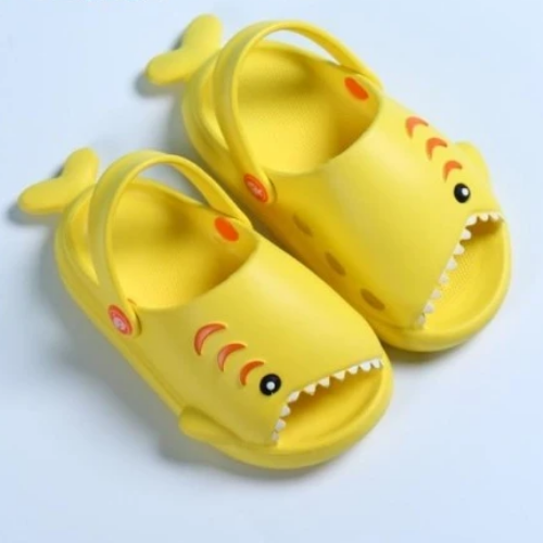 Close-up of the shark fin detail on kids' summer comfort slippers with secure back strap.