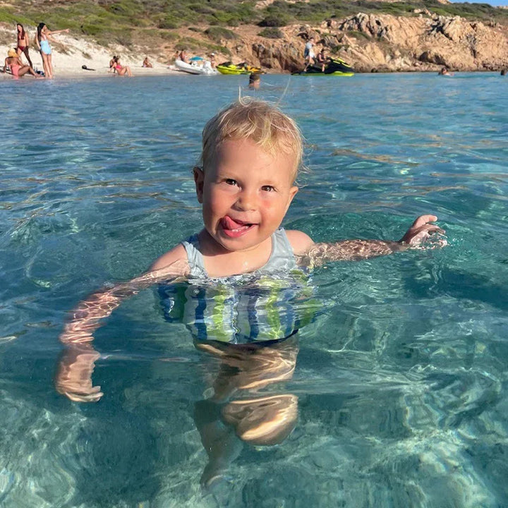 Pool fun with safety: Kids' float vest, built-in shorts, UV sun protection for toddlers.