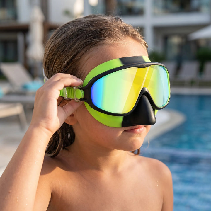 Kids' swim mask with integrated nose cover & wide view for comfortable underwater fun in pool or ocean.