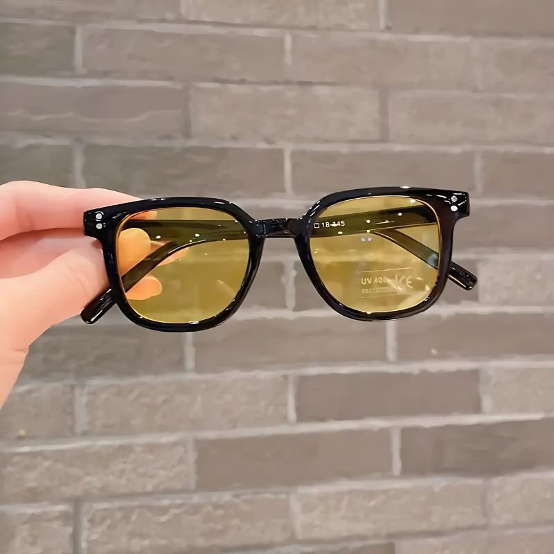 Detail view of vintage square UV400 sunglasses' hinge, demonstrating quality children's outdoor accessories