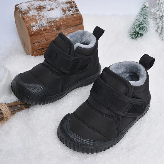 Kids' warm black snow boots with anti-slip sole for winter play, plush lining.