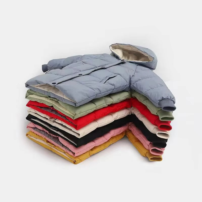 Toddler wearing a vibrant red warm cotton puffer jacket, ideal for winter outdoor play